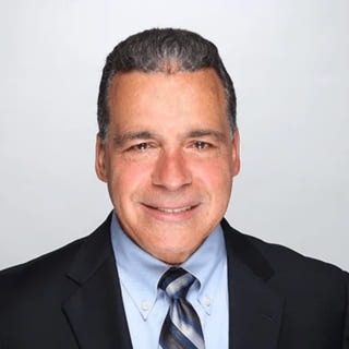 John Ioannou — Chairman