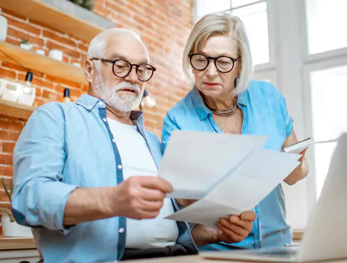 older couple reviewing finances