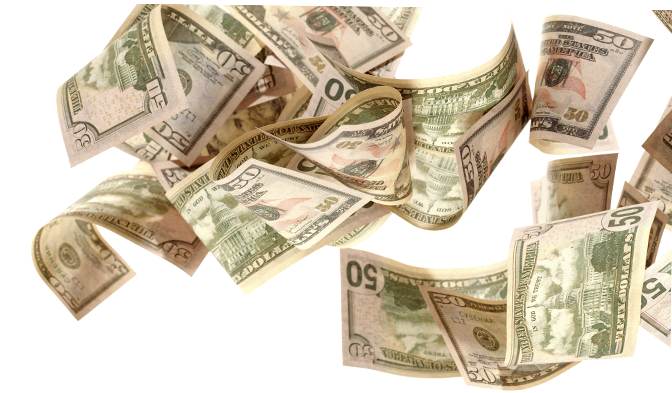 U.S. dollar bills floating in the air against a white background