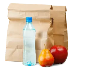 Paper lunch bags with a water bottle, apple, and pear arranged in front.
