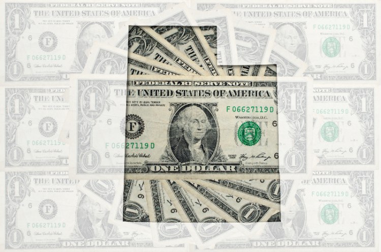 Dollar bills with the state of Utah highlighted by Century Support Services
